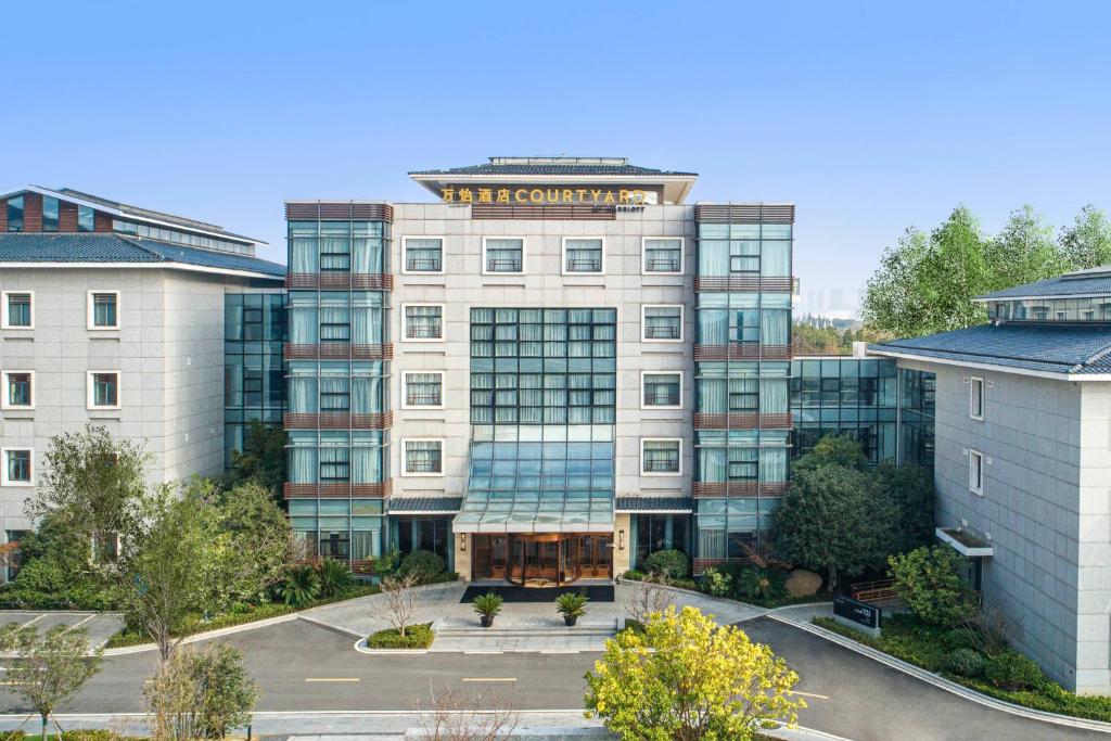 an aerial view of a building at Courtyard by Marriott Wuxi Lihu Lake in Wuxi