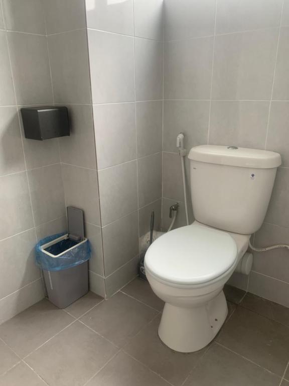 Koupelna v ubytování 休闲民宿 Leisure Homestay @The Venus Sitiawan