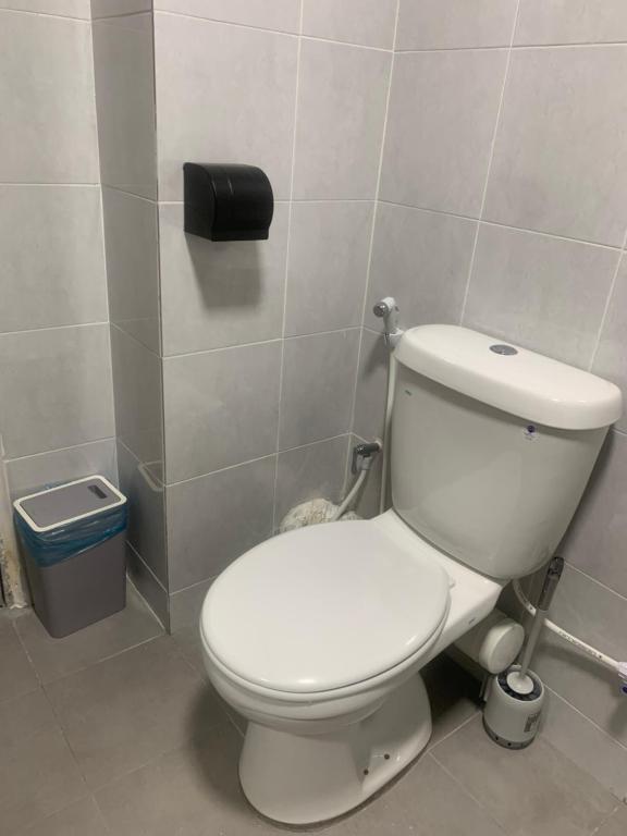 Koupelna v ubytování 休闲民宿 Leisure Homestay @The Venus Sitiawan