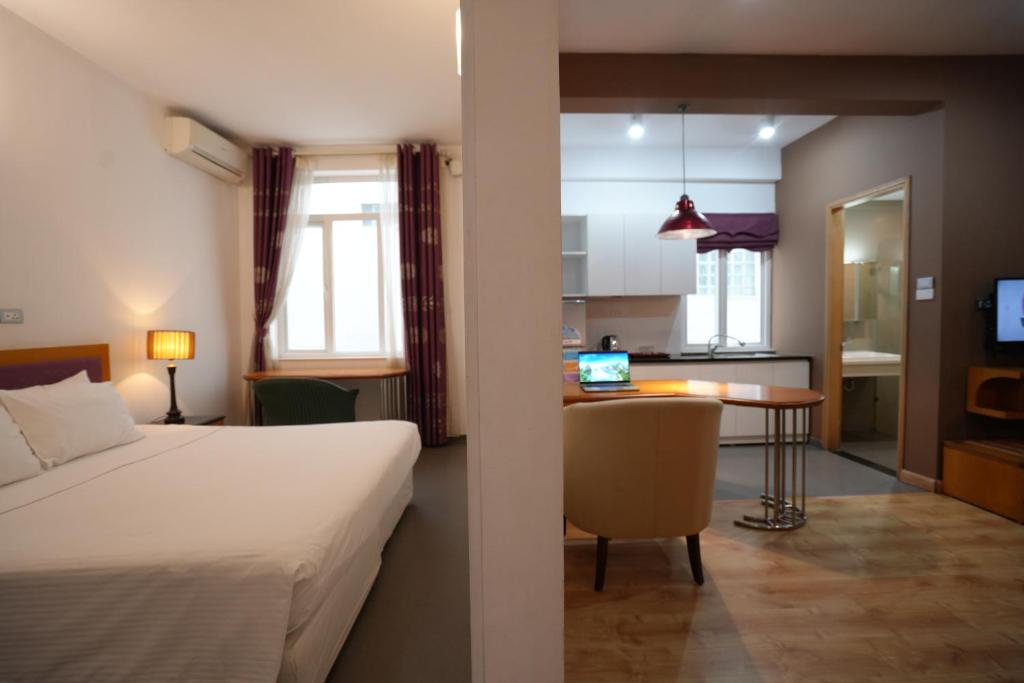 Golden Sunshine Villa Hotel and Travel - Appartement De Deux Chambres