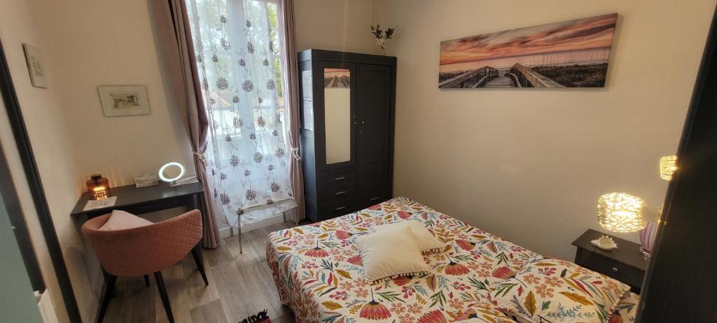 Postel nebo postele na pokoji v ubytování Résidence Fleur des Pins - Gites & Chambres d'Hôtes