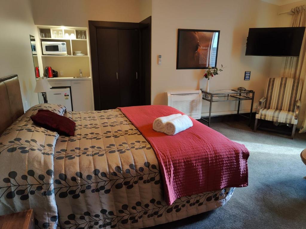 Postel nebo postele na pokoji v ubytování Gateway Motor Inn