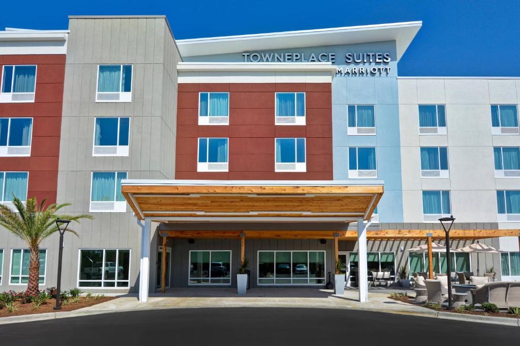 a rendering of the front of a hotel at TownePlace Suites by Marriott Panama City Beach Pier Park in Panama City Beach