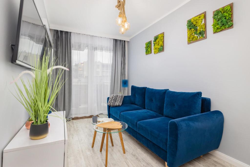 Posedenie v ubytovaní Kapitański Mostek Apartments Kołobrzeg by Noclegi Renters