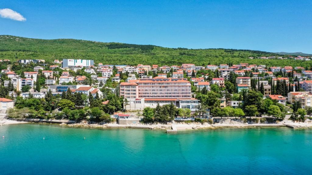 a city on the shore of a body of water at Mediteran Hotel by Aminess in Crikvenica