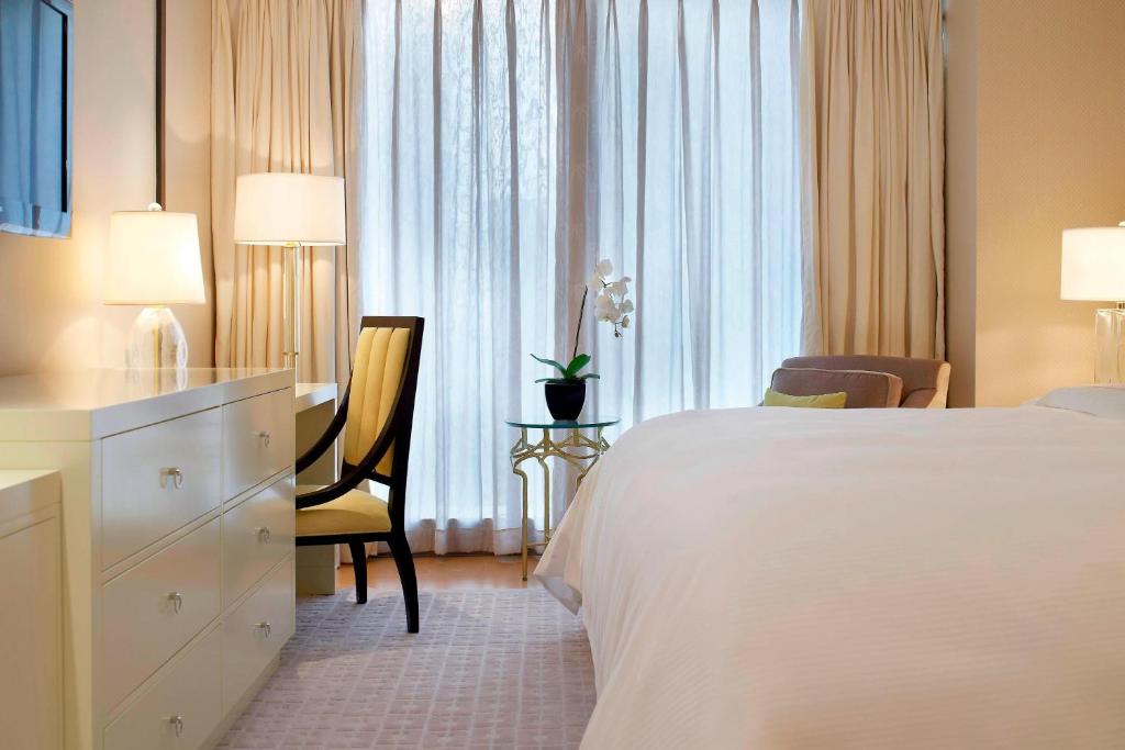 Postel nebo postele na pokoji v ubytování The Westin Tianjin