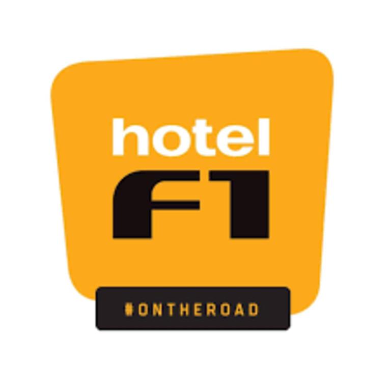a yellow intel logo with the intel fhd logo at hotelF1 Lyon Bourgoin-Jallieu in LʼIsle-dʼAbeau