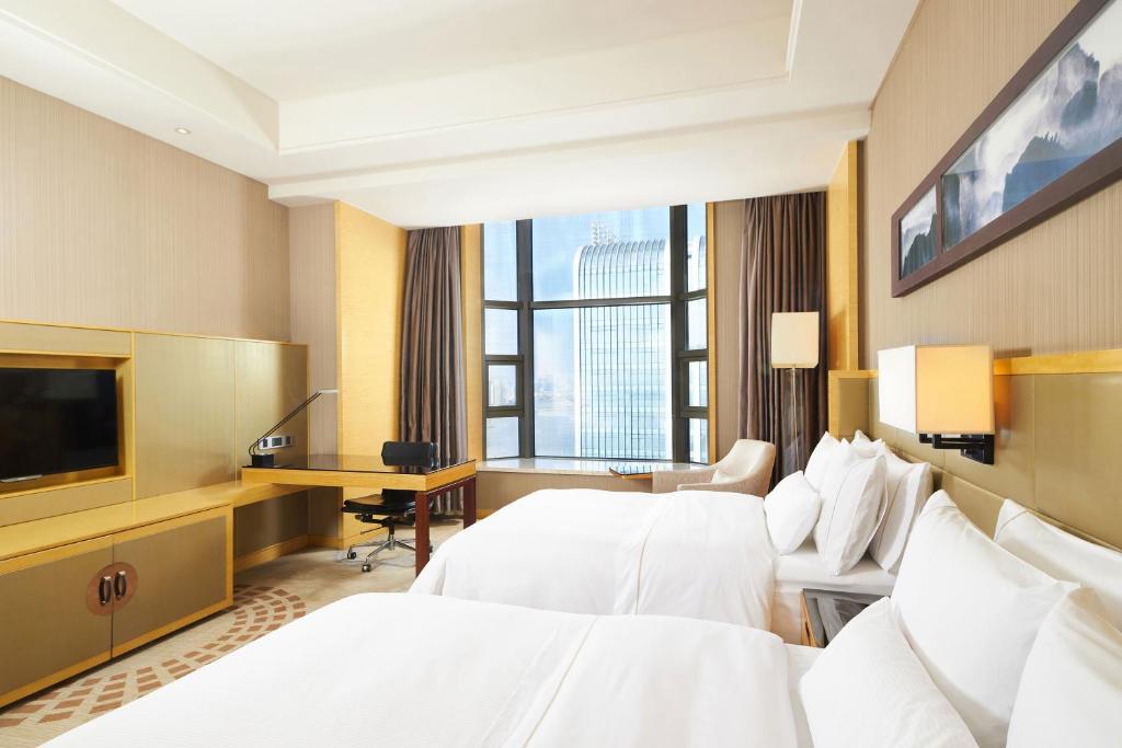 TV a/nebo společenská místnost v ubytování The Westin Fuzhou Minjiang