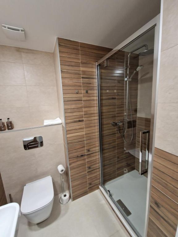 Koupelna v ubytování Hotel Grand