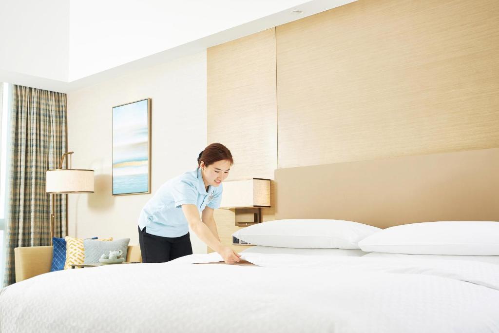 Postel nebo postele na pokoji v ubytování Four Points by Sheraton Jiaxing
