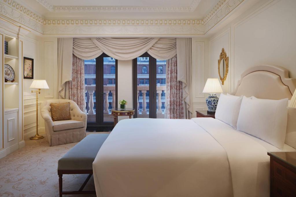 Postel nebo postele na pokoji v ubytování The Ritz-Carlton, Tianjin