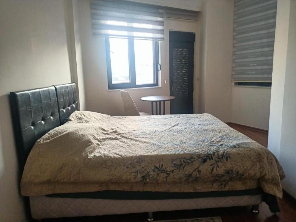 Postel nebo postele na pokoji v ubytování Old Town Grand Apart Hotel