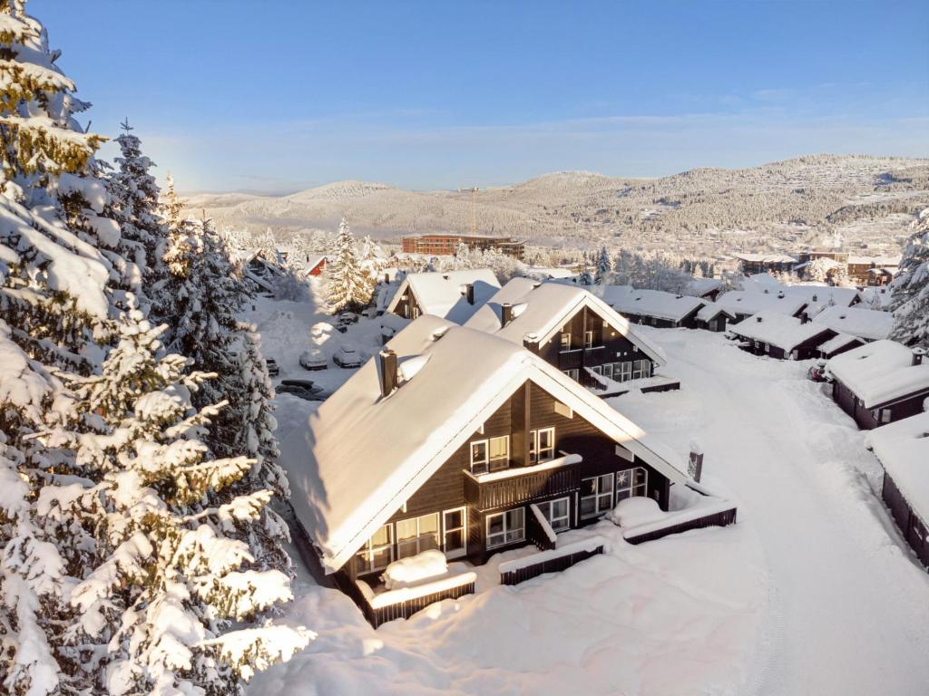 an aerial view of a house covered in snow at Trysil Alpin 40A in Trysil