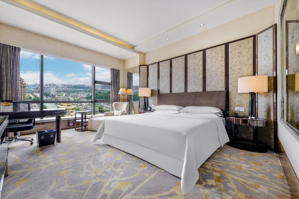Postel nebo postele na pokoji v ubytování Sheraton Zhongshan Hotel