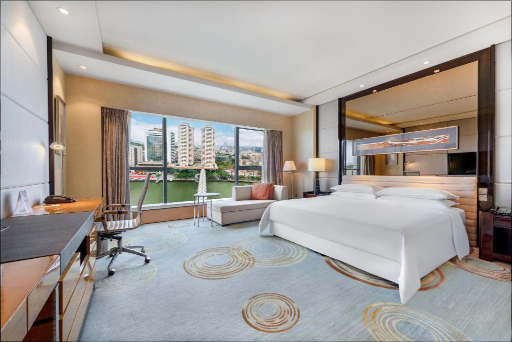 Postel nebo postele na pokoji v ubytování Sheraton Zhongshan Hotel