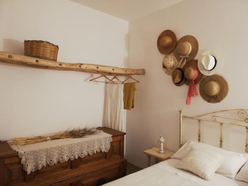 Łóżko lub łóżka w pokoju w obiekcie Trulli Bosco Selva