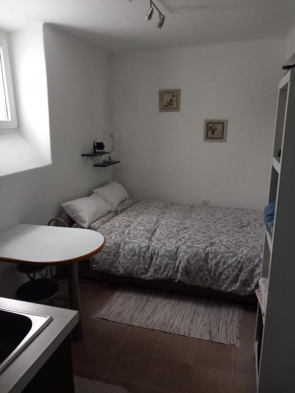 Lova arba lovos apgyvendinimo įstaigoje Apartment Lan