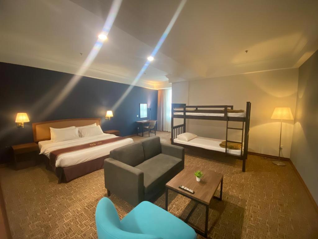 Postel nebo postele na pokoji v ubytování Classic Hotel