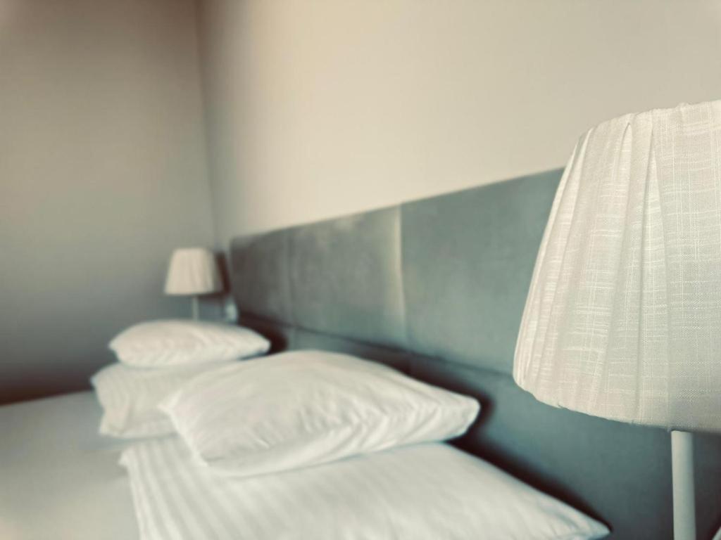 Postel nebo postele na pokoji v ubytování Śpij w Kudowie Apartament i pokoje gościnne