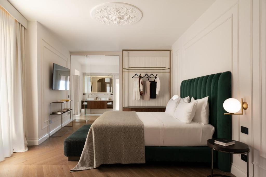 Postel nebo postele na pokoji v ubytování Patria Palace Lecce - The Leading Hotels of The World