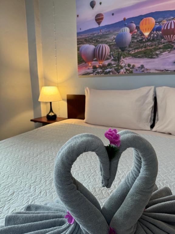 Postel nebo postele na pokoji v ubytování S a f e Residence Patong