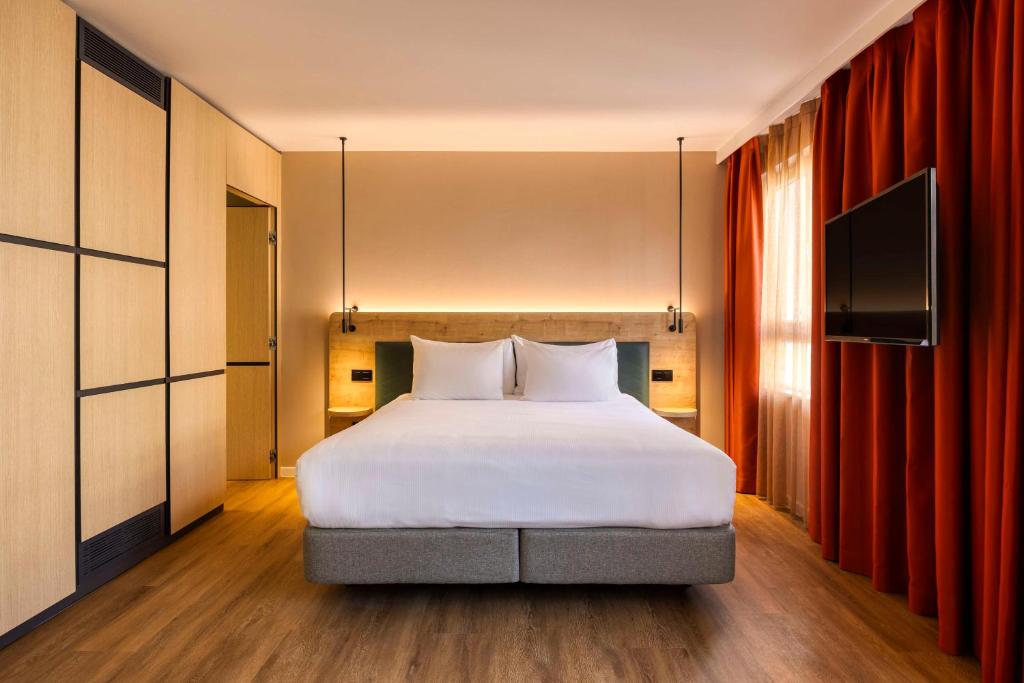 Postel nebo postele na pokoji v ubytování Hilton Garden Inn Brussels City Centre