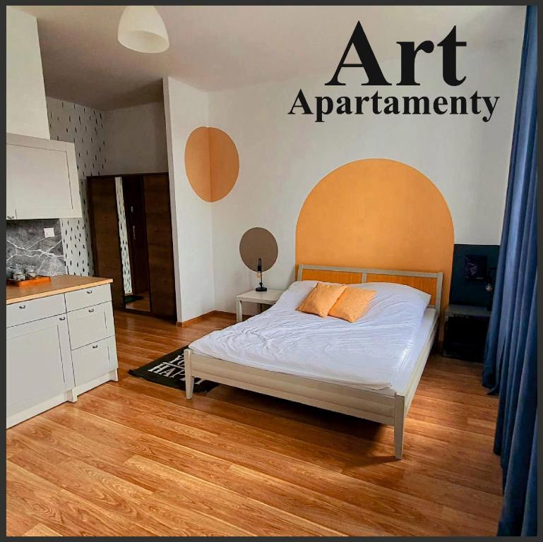 Vuode tai vuoteita majoituspaikassa Art Apartamenty 2