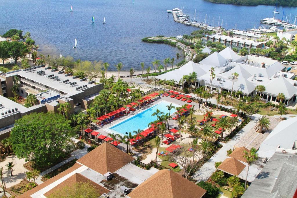 an aerial view of a resort with a pool and a marina at Sandpiper Bay All-Inclusive, Trademark Collection by Wyndham in Port Saint Lucie