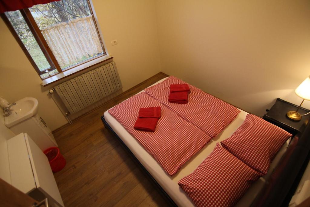 Postel nebo postele na pokoji v ubytování CJA Guesthouse