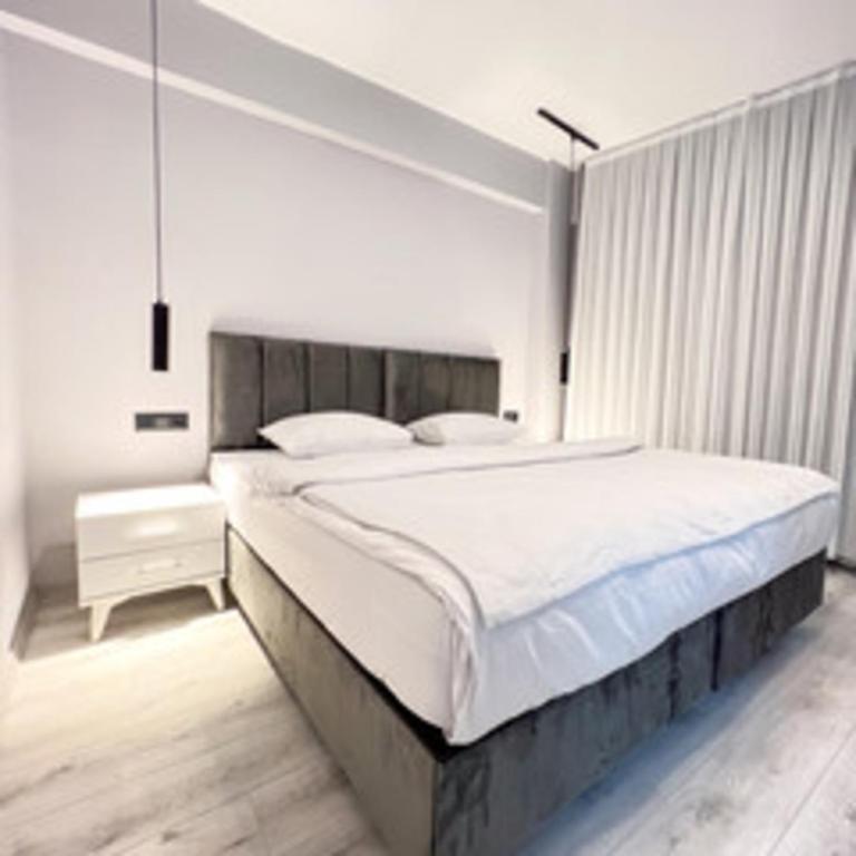 Postel nebo postele na pokoji v ubytování Galata Inn Hotel