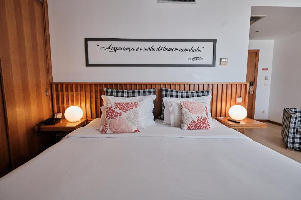Кровать или кровати в номере Hotel Praia Marina by RIDAN Hotels