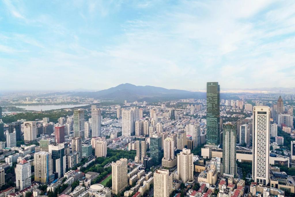 an aerial view of a city with tall buildings at The Ritz-Carlton, Nanjing in Nanjing