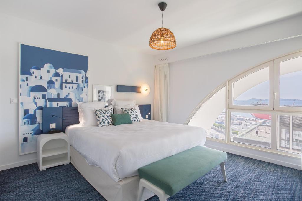 Postel nebo postele na pokoji v ubytování Appart Hotel Odalys City Marseille Centre Euromed