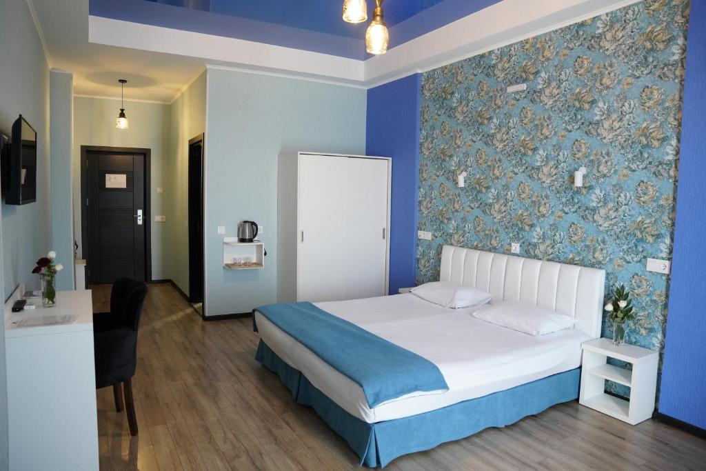 Postel nebo postele na pokoji v ubytování Hotel Panoramic