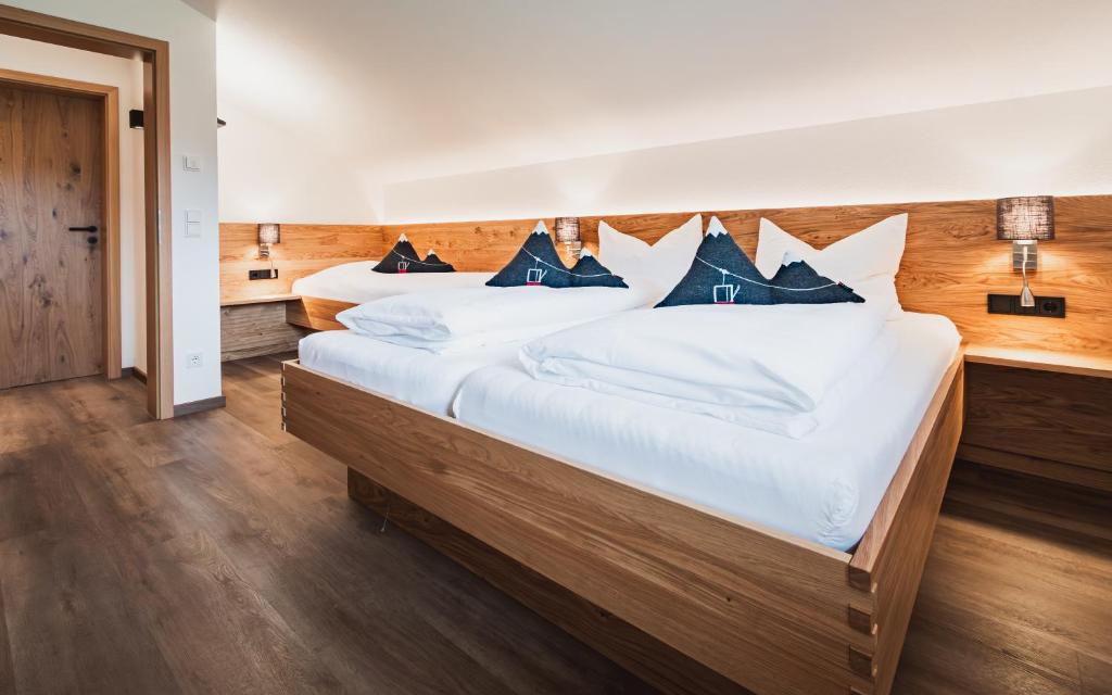 Postel nebo postele na pokoji v ubytování Gsolhof