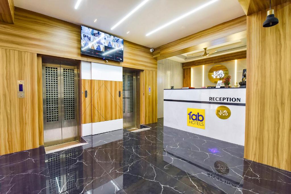 TV a/nebo společenská místnost v ubytování FabHotel Bliss