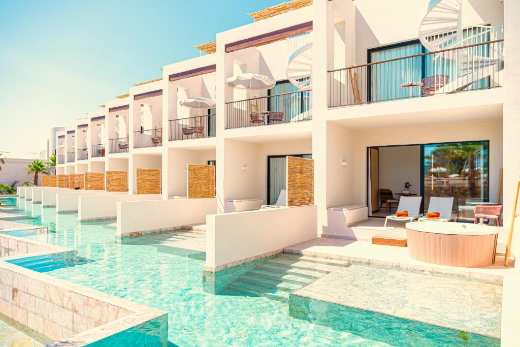 a view of the hotel from the pool at The Signature Level at TRS Ibiza Hotel - All Inclusive Adults Only - Entrance to Clubs included in San Antonio