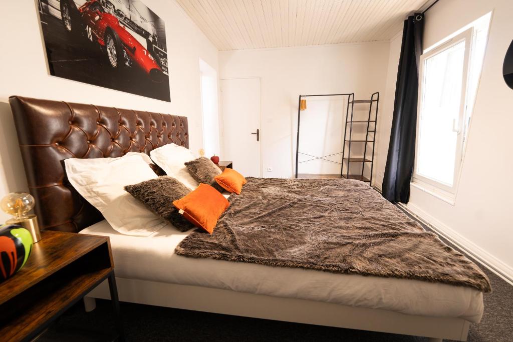 Postel nebo postele na pokoji v ubytování Le Circuit - Tout simplement: confort!