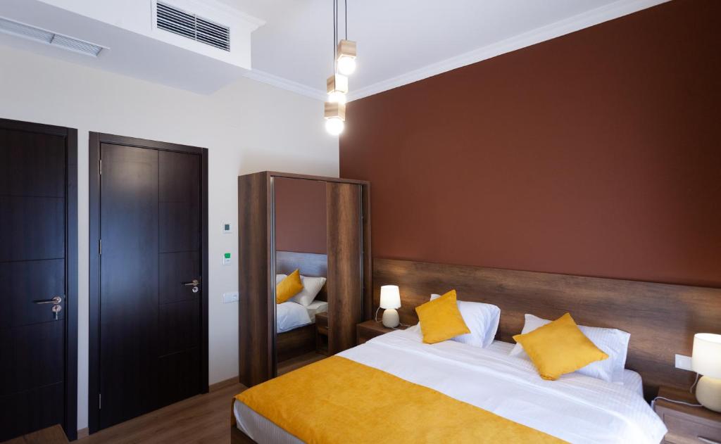 Postel nebo postele na pokoji v ubytování Hotel Avenue 106