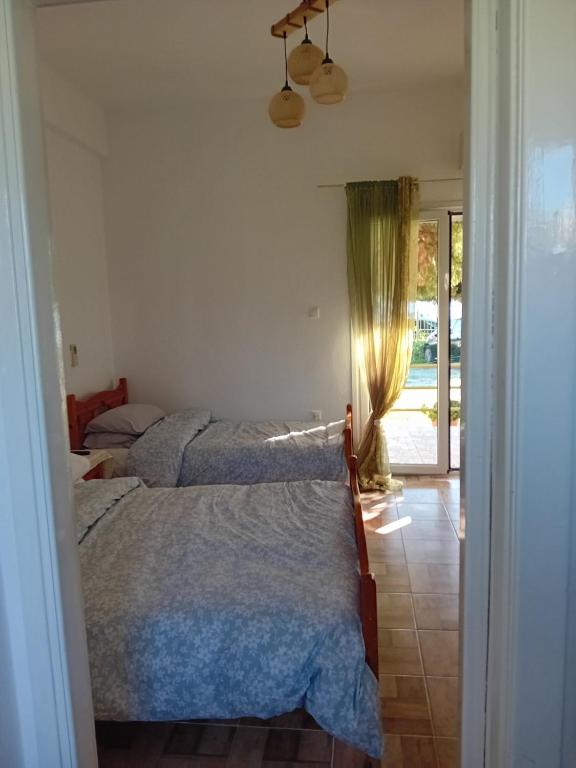 Postel nebo postele na pokoji v ubytování Leylandi rooms