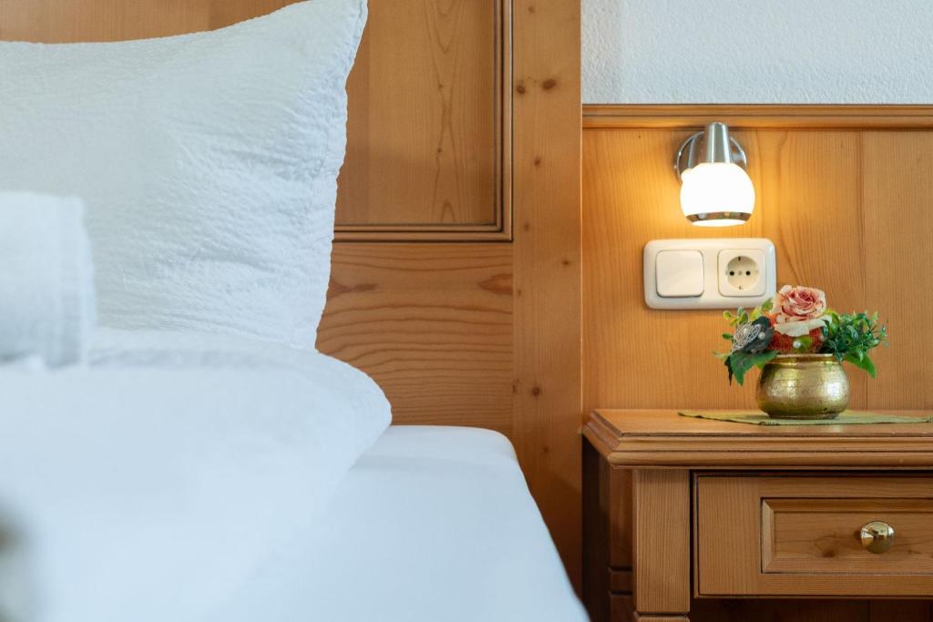 Postel nebo postele na pokoji v ubytování Appartement Predigstuhlblick mit Indoorpool und Sauna