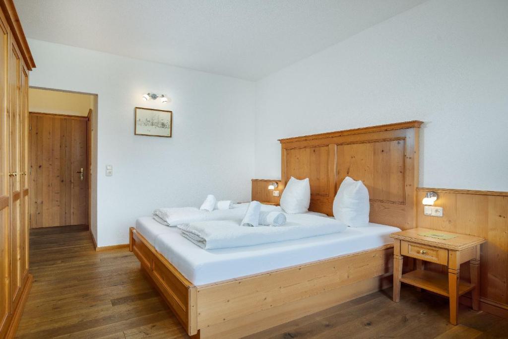 Postel nebo postele na pokoji v ubytování Appartement Predigstuhlblick mit Indoorpool und Sauna