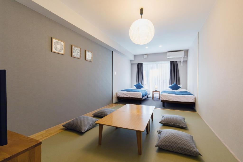 Postel nebo postele na pokoji v ubytování HOTEL ECCLESIA