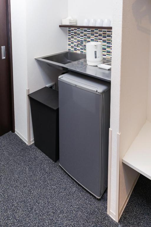 Kuchyň nebo kuchyňský kout v ubytování HOTEL ECCLESIA