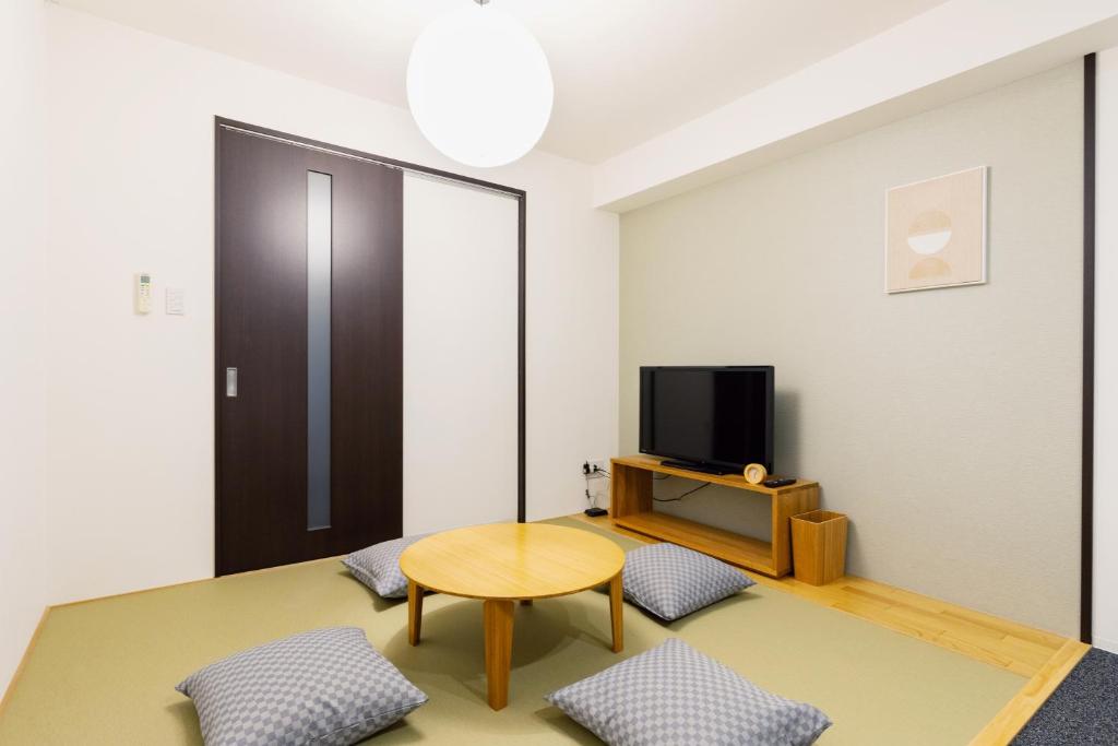 TV a/nebo společenská místnost v ubytování HOTEL ECCLESIA
