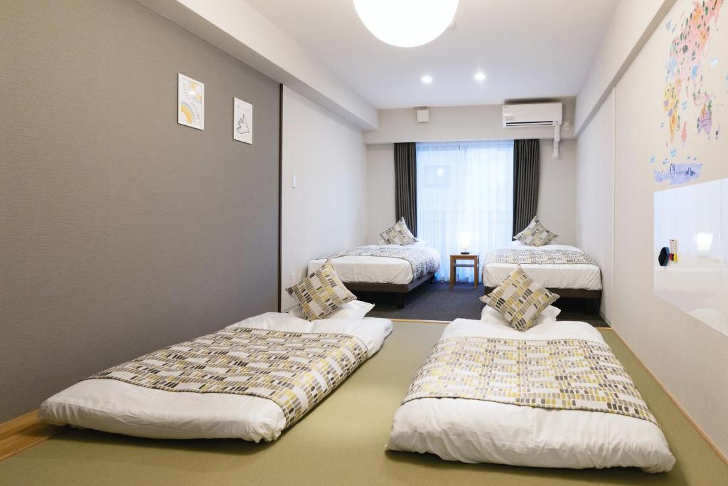 Postel nebo postele na pokoji v ubytování HOTEL ECCLESIA