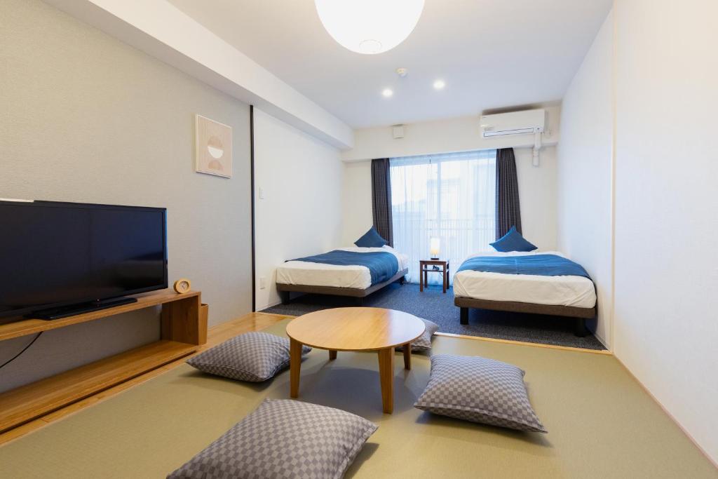 Postel nebo postele na pokoji v ubytování HOTEL ECCLESIA