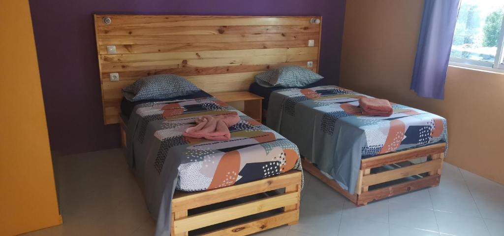Postel nebo postele na pokoji v ubytování casa alcindo