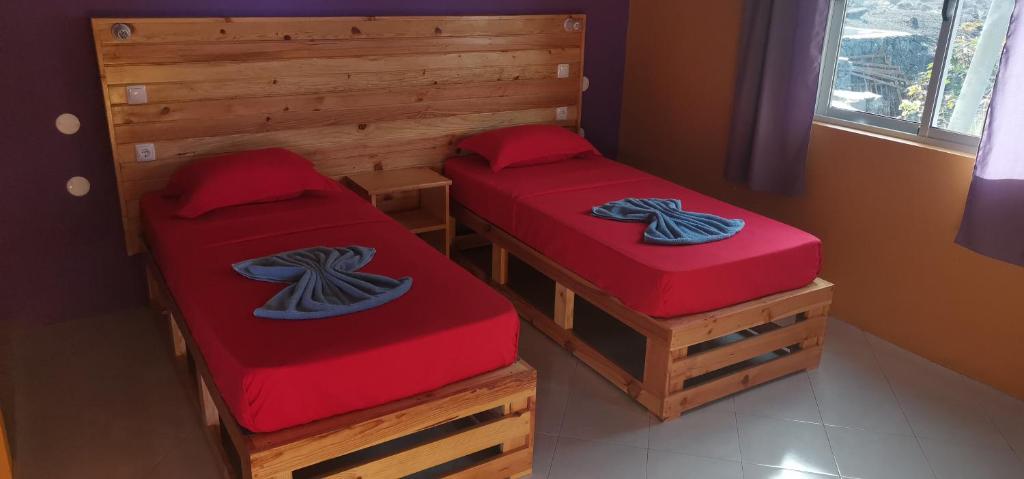 Postel nebo postele na pokoji v ubytování casa alcindo