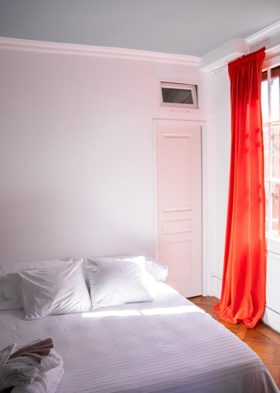 Postel nebo postele na pokoji v ubytování Le Chalet d'Ouchy